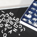 Rillengummitafeln und Buchstaben